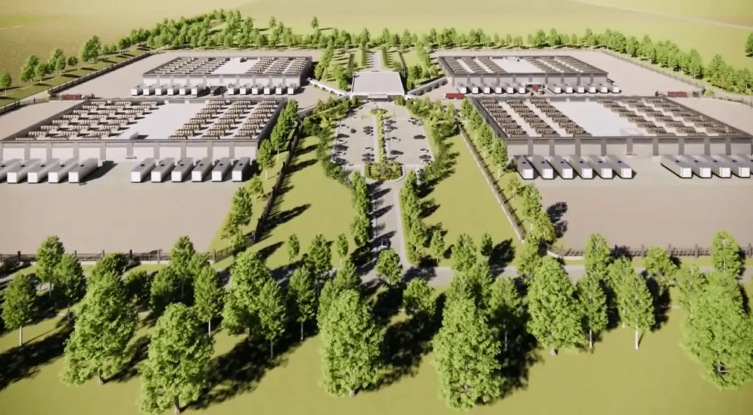 Aerial rendering of a large industrial campus with rows of warehouse-style buildings surrounded by trees
