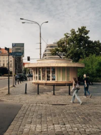 Chleboteka Okraglak by CUDO seen across the cobbled square