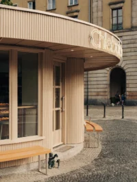 The Chleboteka sign and the bench at Chleboteka Okraglak by CUDO
