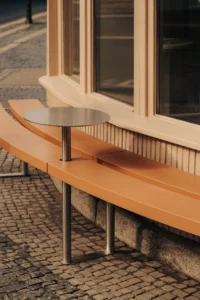 The continuous bench running around Chleboteka Okraglak by CUDO