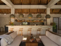 The bar counter and pendant lights at Esh Hotel and Spa by FAMM Arquitectura