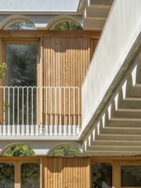 Timber balcony detail at Espace Ambroise Croizat by TAUTEM Architecture