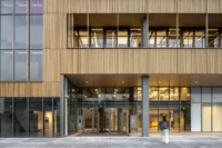 The glazed entrance level of Ferro Offices by GROUP A on Ferro Square