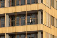 Recessed terraces on the south face of Ferro Offices by GROUP A