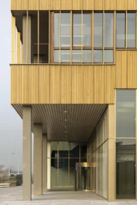 The upper timber volume over the glazed ground floor at Ferro Offices