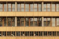 Facade of Ferro Offices by GROUP A with its terraces and timber louvers