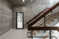 Restored stair and exposed concrete of the original 1969 frame, Ferro Offices