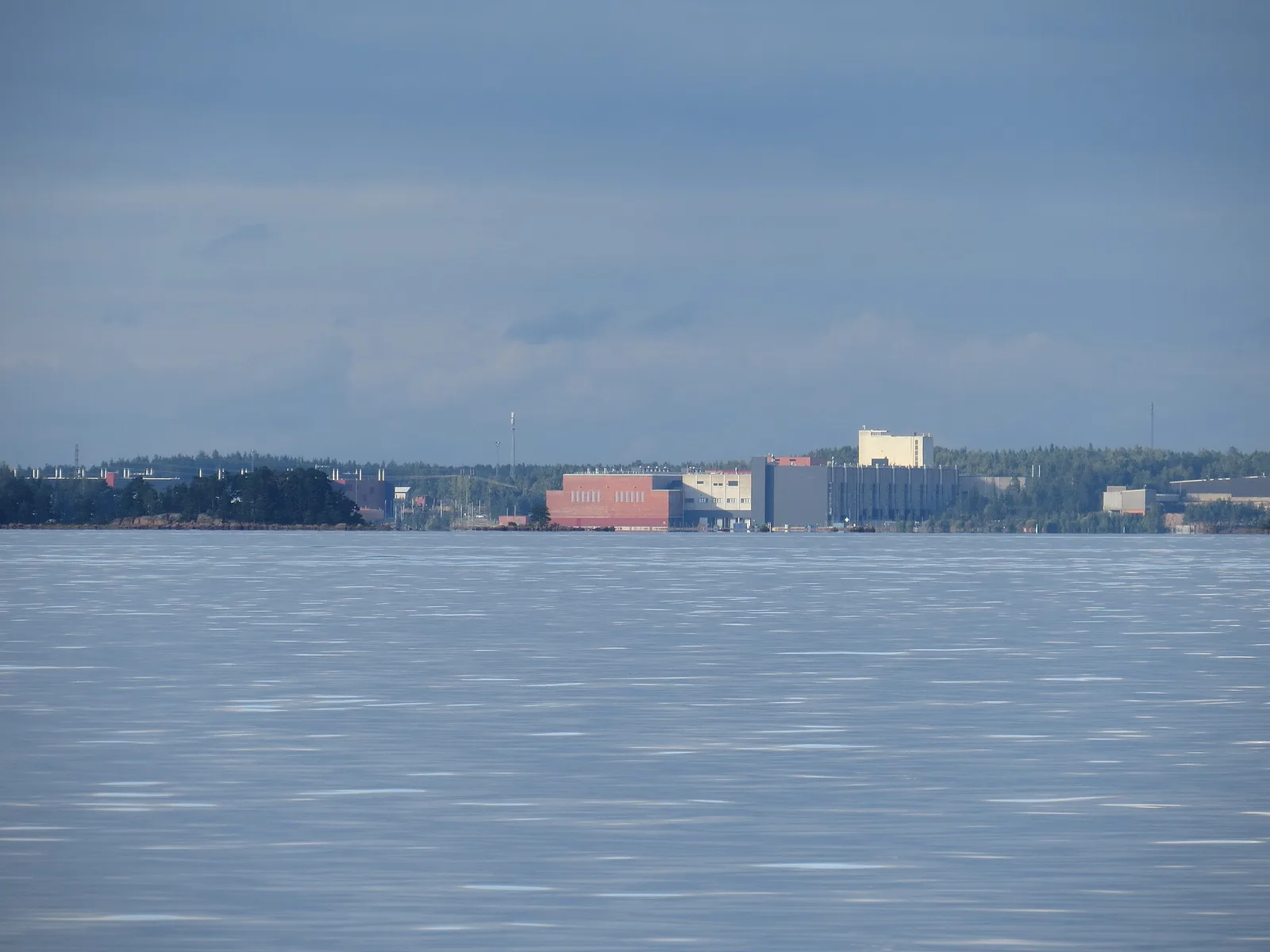 Google's Hamina data centre in Finland seen across the water, built on the site of the former Summa paper mill