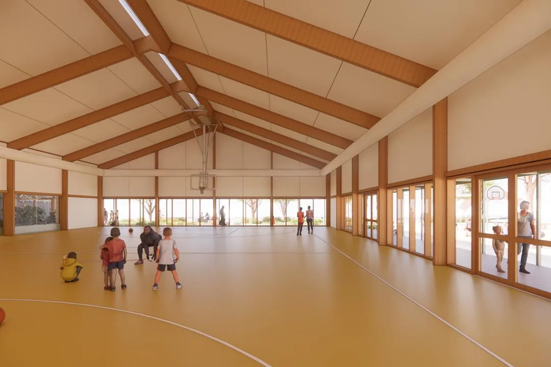 Rendering of a bright timber-framed indoor court with children playing basketball and glazed doors