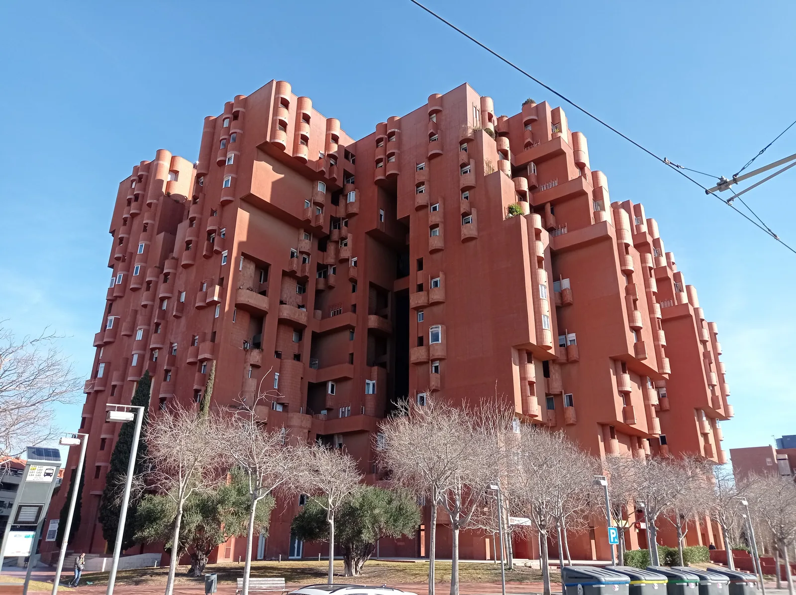 Walden 7 by Ricardo Bofill near Barcelona, red towers stepping and leaning into each other around courtyards