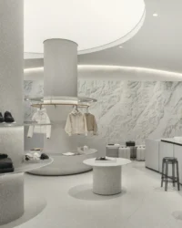 Displays and a terrazzo column under the circular ceiling recess