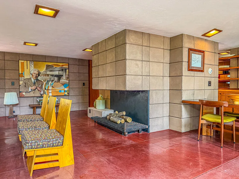 Interior with Cherokee red concrete floors, mahogany trim and built in seating