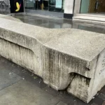 Hostile architecture example: the sloped concrete Camden bench on Great Queen Street, Holborn, London