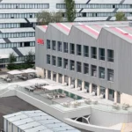 Narxoz University Business School by AGP Architects, its rebuilt sawtooth roof seen from above