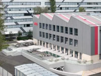 Narxoz University Business School by AGP Architects, its rebuilt sawtooth roof seen from above