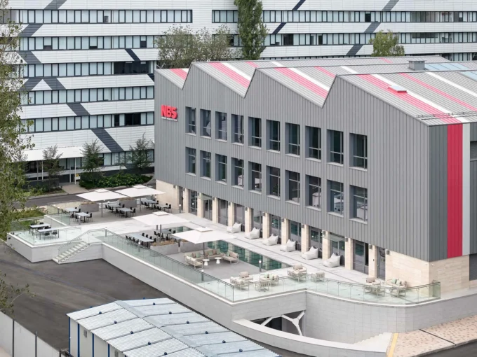 Narxoz University Business School by AGP Architects, its rebuilt sawtooth roof seen from above