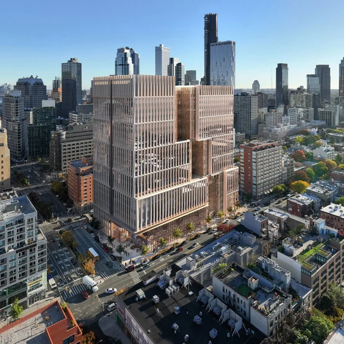 Aerial rendering of a tall tiered building with wood-toned facades amid a dense urban skyline