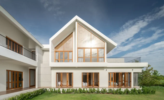 PIN'N PAN House by ForX Design Studio, its gabled volumes above the garden in Ratchaburi