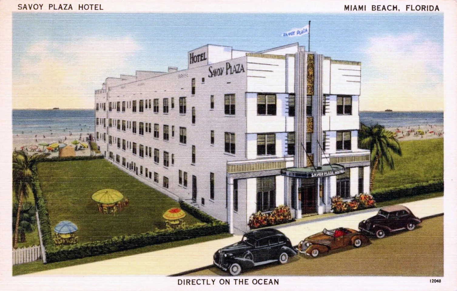 1940s postcard of the Art Deco Savoy Plaza Hotel on Ocean Drive with vintage cars parked in front and the ocean behind