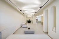 The reception hall of Nafas-e-No Clinic under its curved ceiling