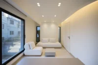 Seating below the large window in a consulting room, Nafas-e-No Clinic