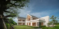 PIN'N PAN House by ForX Design Studio beside a mature tree