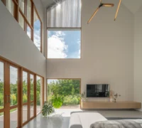 The double-height living space at PIN'N PAN House by ForX Design Studio