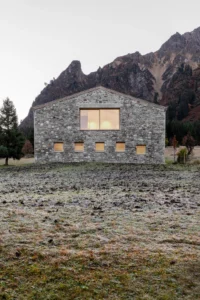The gable end of Vergalderie by Christian Tonko with its windows lit