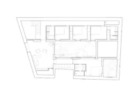 First floor plan with bedrooms arranged around the courtyard void