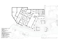 Basement floor plan with support rooms set into the sloping ground, Moganshan Liaoyuan Theater by One Design