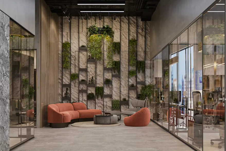 Office lobby with a planted shelving wall, coral sofas and glazed partitions