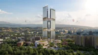 Rendering of two tall glass towers joined by bridges rising above trees and low-rise pavilions in central Yerevan