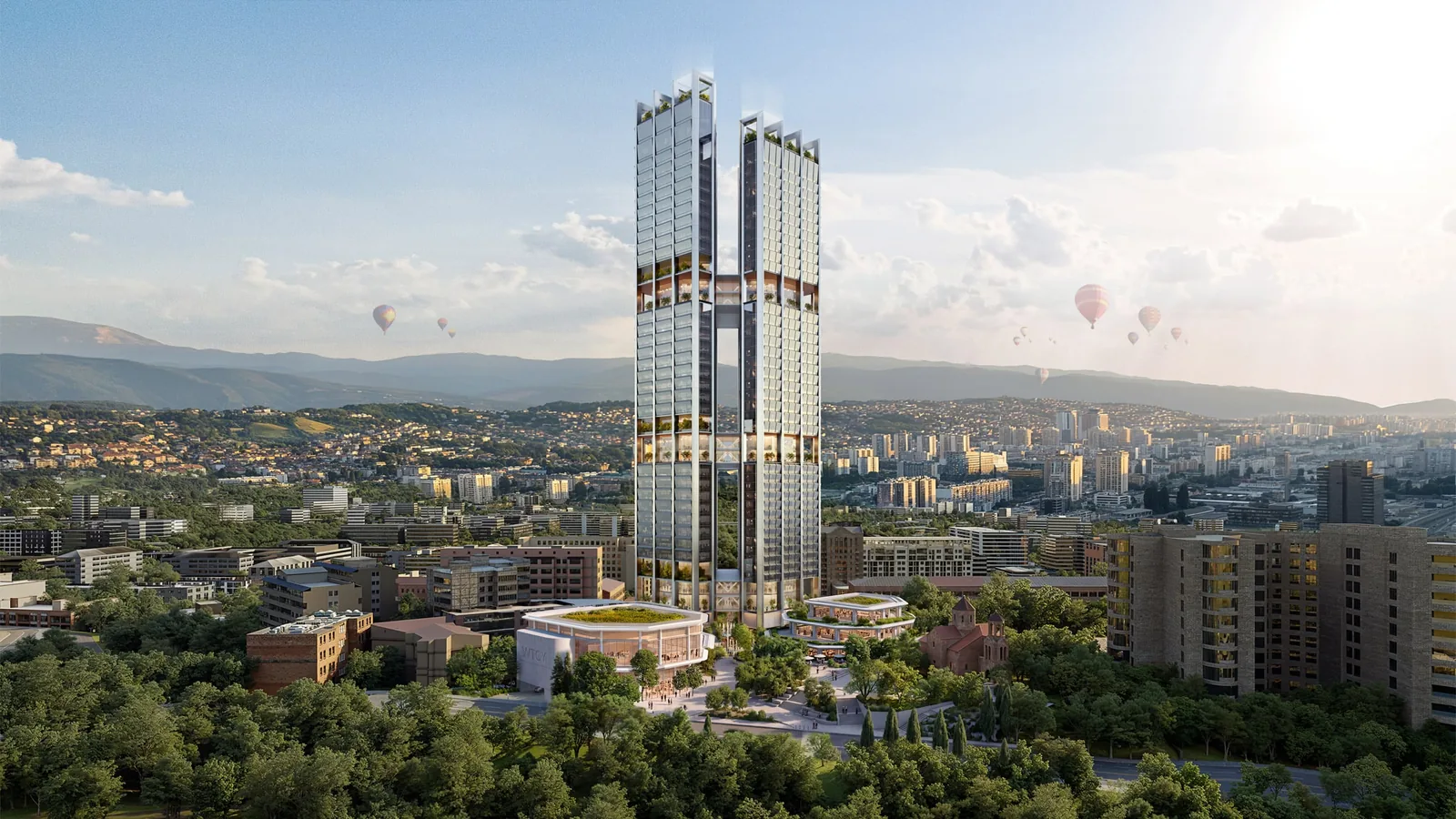 Rendering of two tall glass towers joined by bridges rising above trees and low-rise pavilions in central Yerevan